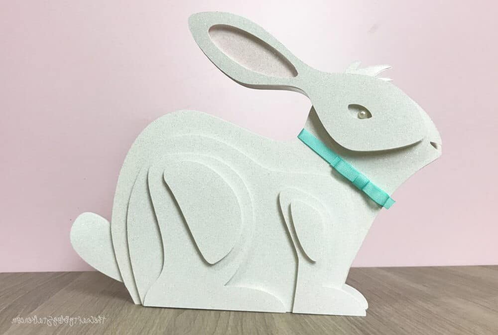 finished layered paper art bunny with a pink background