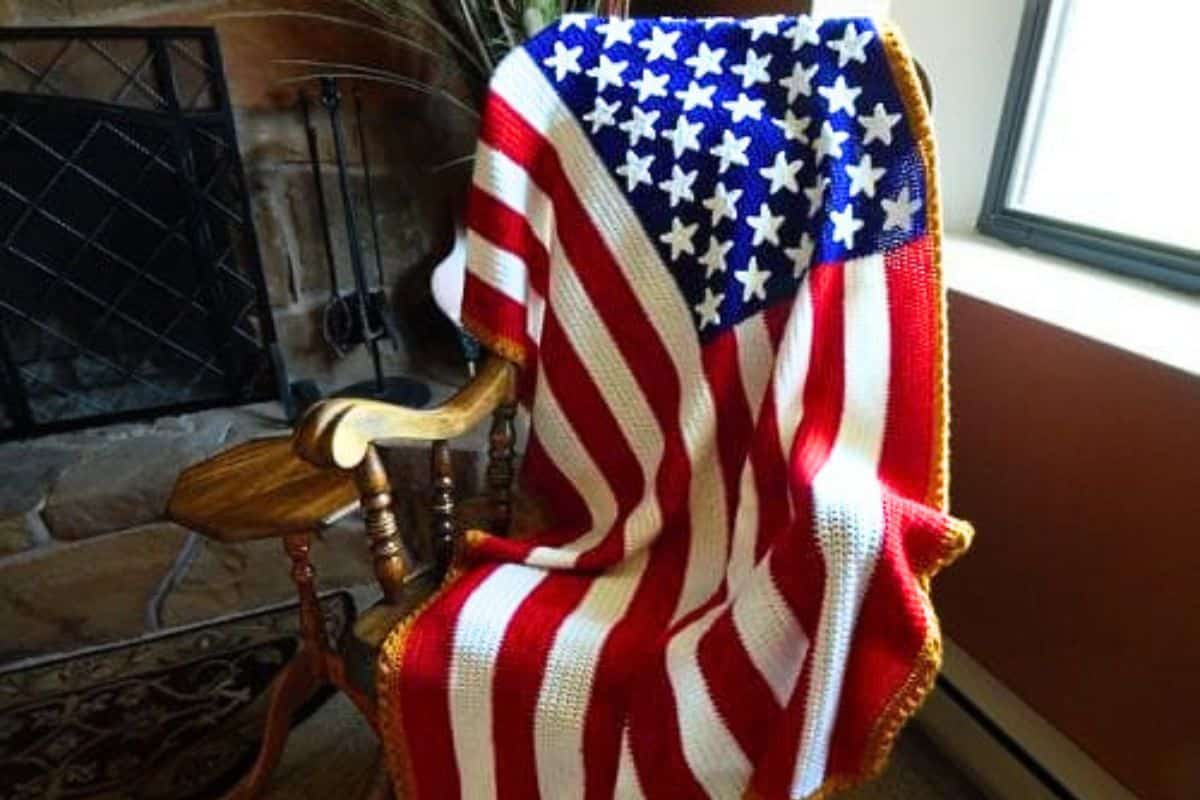 United States Flag Afghan draped on a rocking chair.