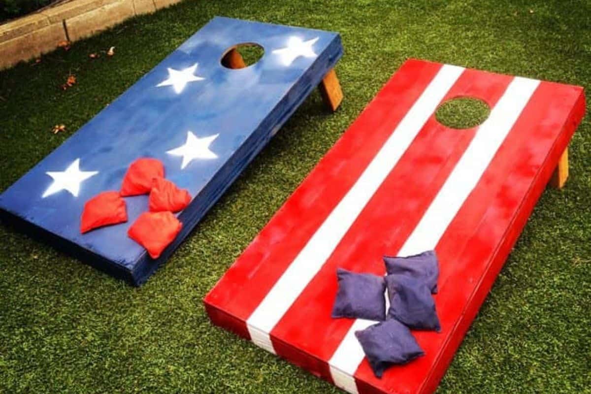 DIY corn hole boards painted with stars and stripes.