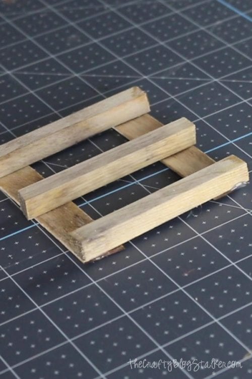 assembling the popsicle pallet coasters