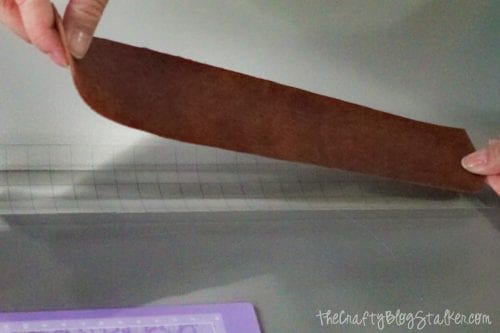 How to Make a DIY Arrow Leather Bracelet with the Cricut Explore Air 2, a tutorial featured by top US craft blog, The Crafty Blog Stalker.