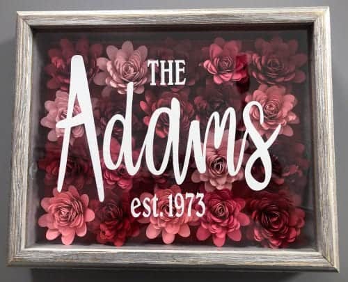 25 Cricut Personalized Gifts featured by top US craft blog, The Crafty Blog Stalker: last name with date in frame.