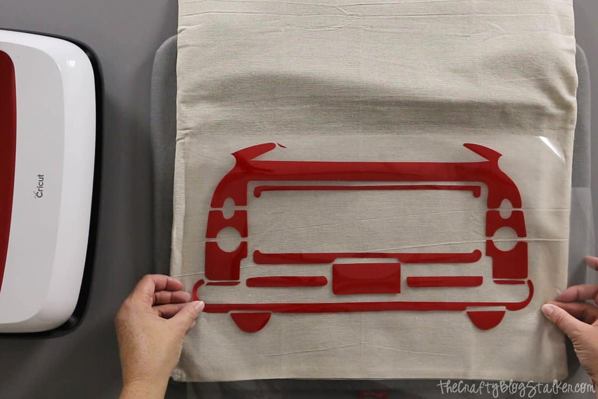 DIY Holiday Throw Pillow tutorial featured by top US craft blog, The Crafty Blog Stalker.r: iron-on vinyl