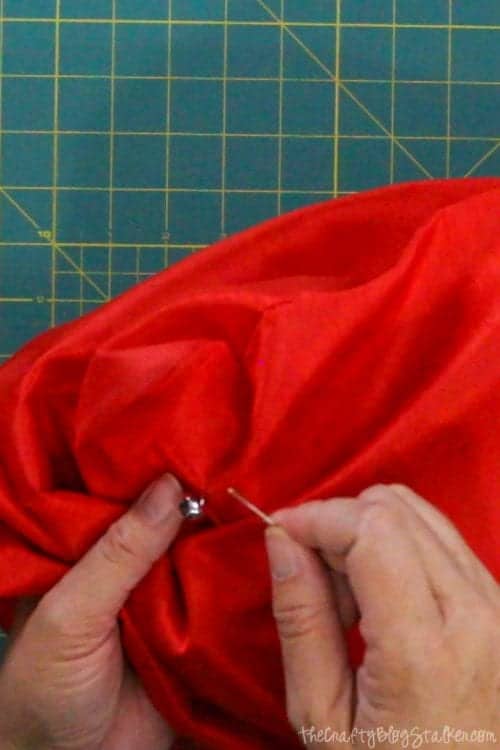How to Make a DIY Holiday Throw Pillow with Bells, a tutorial featured by top US craft blog, The Crafty Blog Stalker.