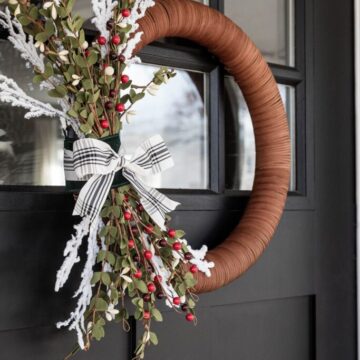 Modern Christmas Wreathing hanging on Black Door