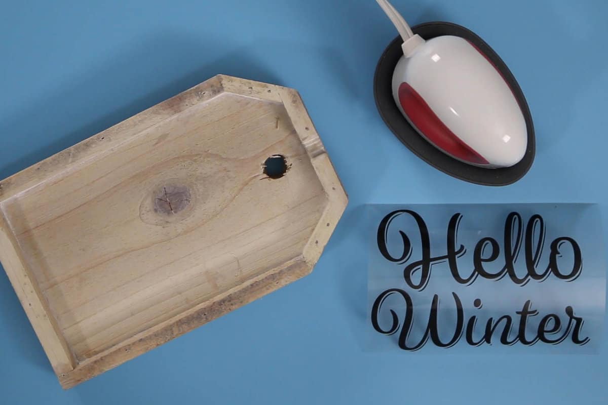 cricut easy press mini, wood tag and iron-on hello winter