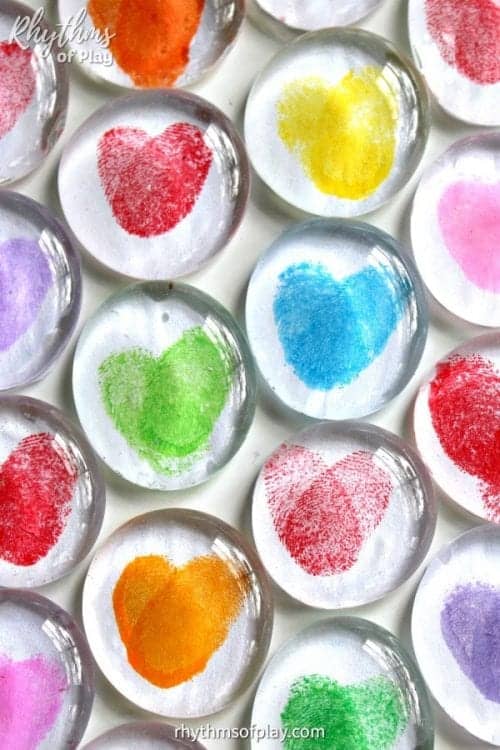 30 Fun Spring Break Crafts you can Make with Children featured by top US craft blog, The Crafty Blog Stalker: Thumbprint Heart Glass Magnets