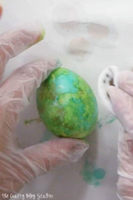 How to Make DIY Alcohol Ink Easter Eggs, a tutorial featured by top US craft blog, The Crafty Blog Stalker.