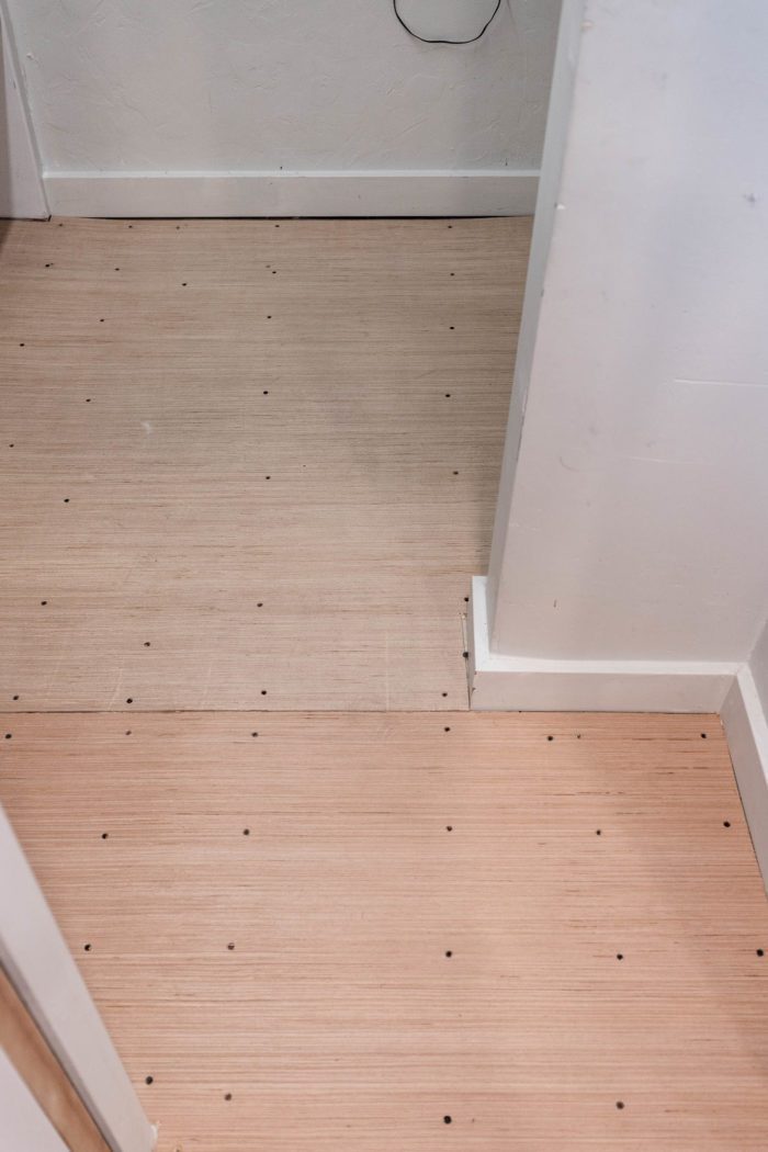 Screw down subfloor to prevent squeaking and broken tiles. 