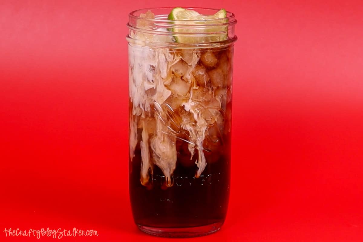 A dirty diet coke in a glass Ball tumbler.