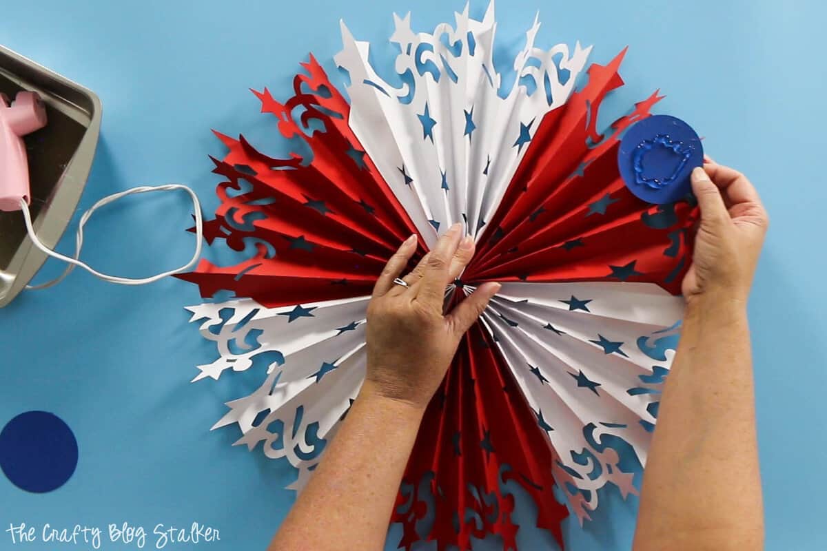 hot glue circle to the center of the  Large DIY Patriotic Paper Rosette to hold it all together