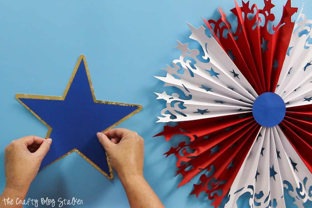 layering the star for the Large DIY Patriotic Paper Rosette 