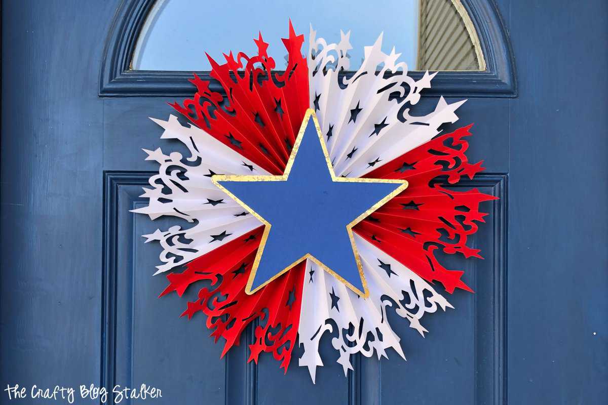 Patriotic paper rosette made with red and white stripes and a blue star.