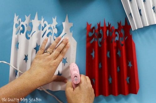 attaching accordion folded pieces for the Large DIY Patriotic Paper Rosette with Cricut