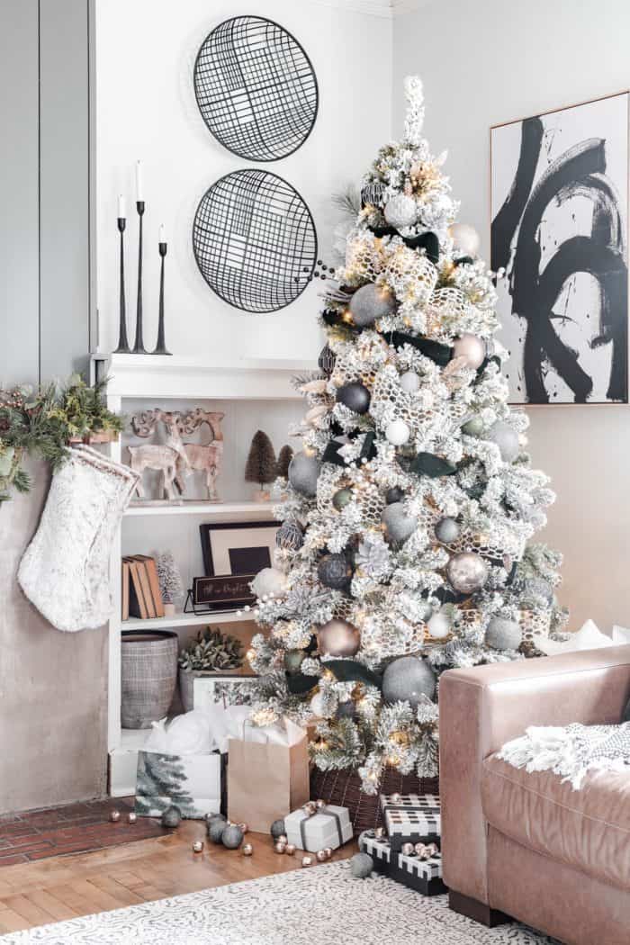 Neutral Modern Cozy Christmas Tree in living room next to built ins. #cherishedbliss #ChristmasTree