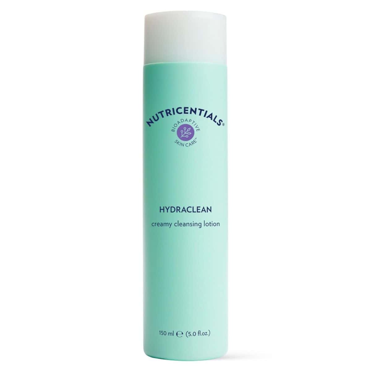 Bottle of Nu Skin Nutricentials Hydraclean Creamy Cleansing Lotion, 150 ml size, in a light teal container with a white cap and purple logo.