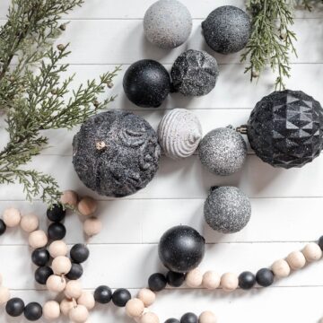 Get the tutorial to make these Easy DIY Stone Christmas Ornaments using old ornaments for a refreshed modern neutral look! #CherishedBliss #ChristmasOrnament