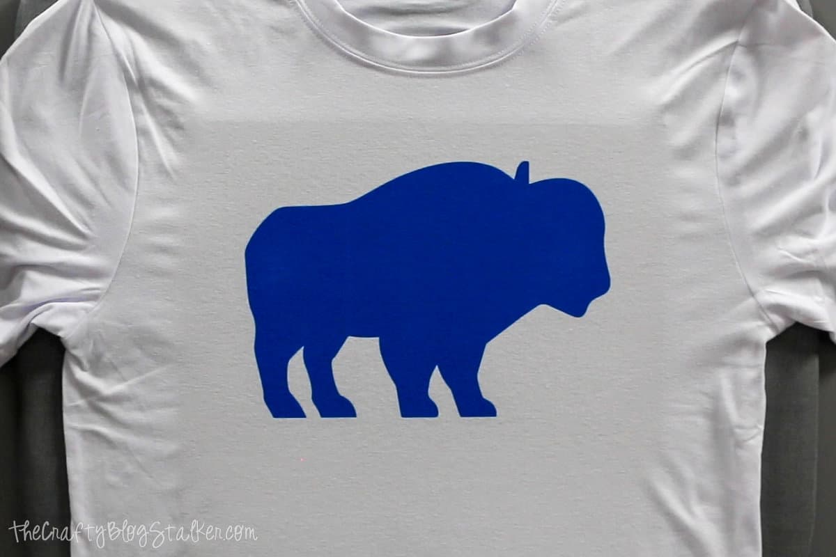 a blue buffalo on a shirt with cricut infusible ink