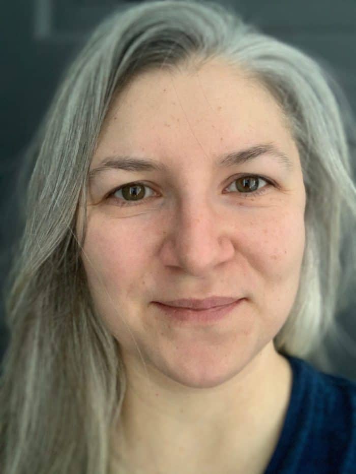 Before photo of woman's face before starting a skincare regimen. Creating a Self Care Routine is necessary for positive mental health. We think there's no time, but it actually helps us be more productive!