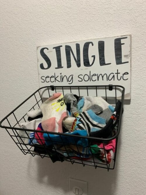 laundry room sign and sock basket