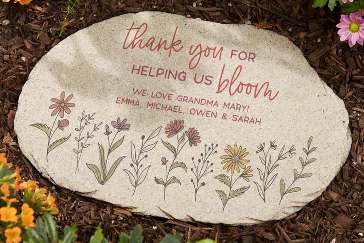 Love Blooms Here Personalized Round Garden Stone.