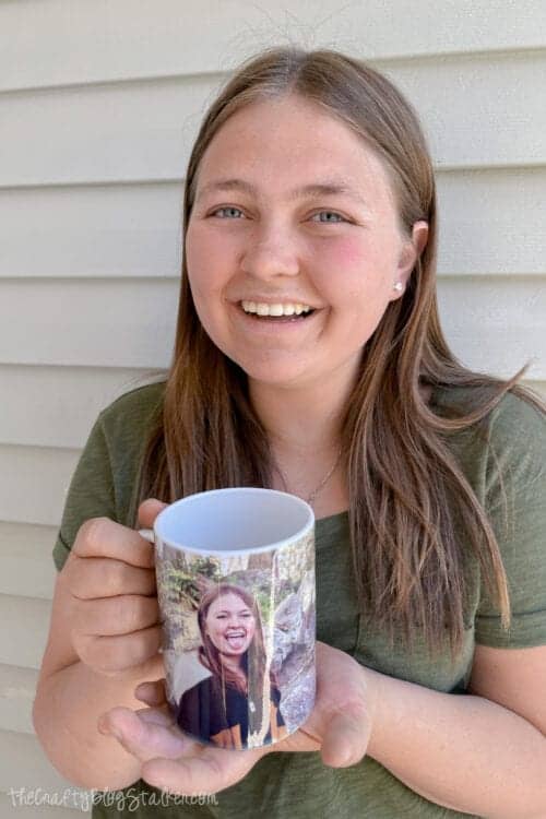 daughter holding personalized mug