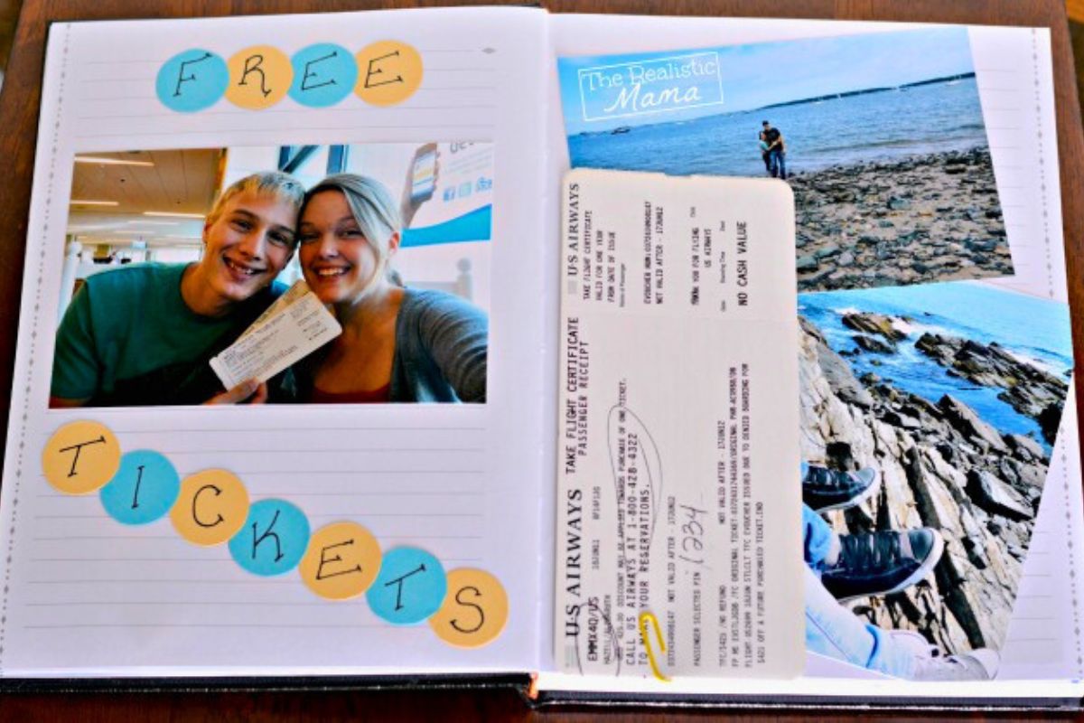 A smash book spread with photos of a couple holding flight tickets, labeled "FREE TICKETS," and vacation snapshots near the ocean, including a boarding pass.