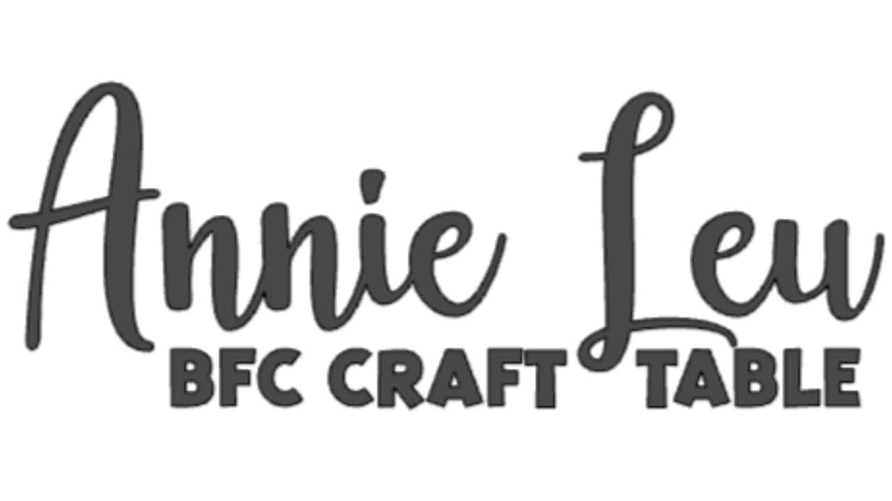 Cricut font example showing “Annie Leu” in a flowing script font and “BFC Craft Table” in bold uppercase block letters.