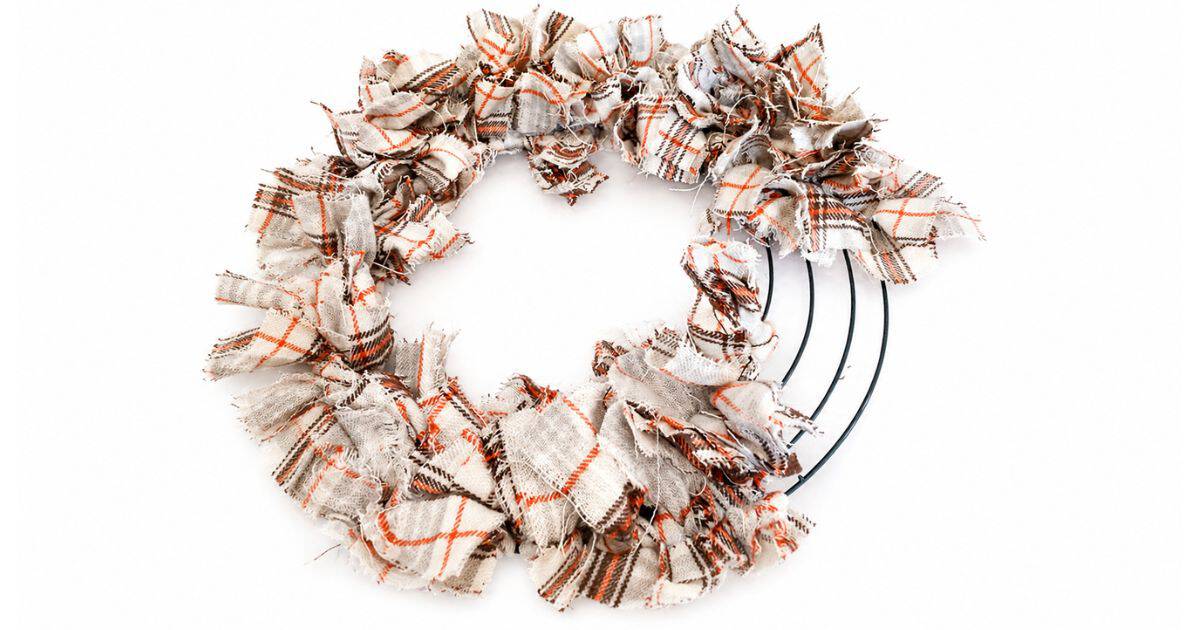 Wire wreath form filled about 75% with tied on fabric strips.