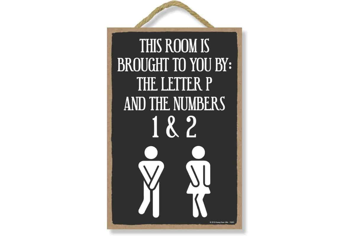 A sign that reads - This room is brought to you by the letter P and the numbers 1 and 2.
