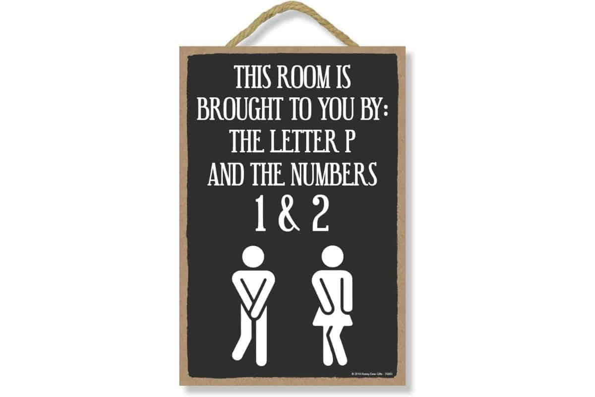 Bathroom Sign - A sign that reads - This room is brought to you by the letter P and the numbers 1 and 2.