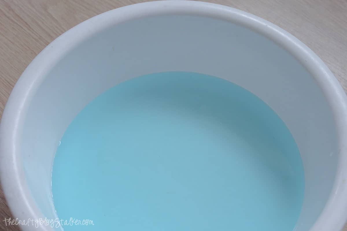 Listerine foot soak in a large white bowl.