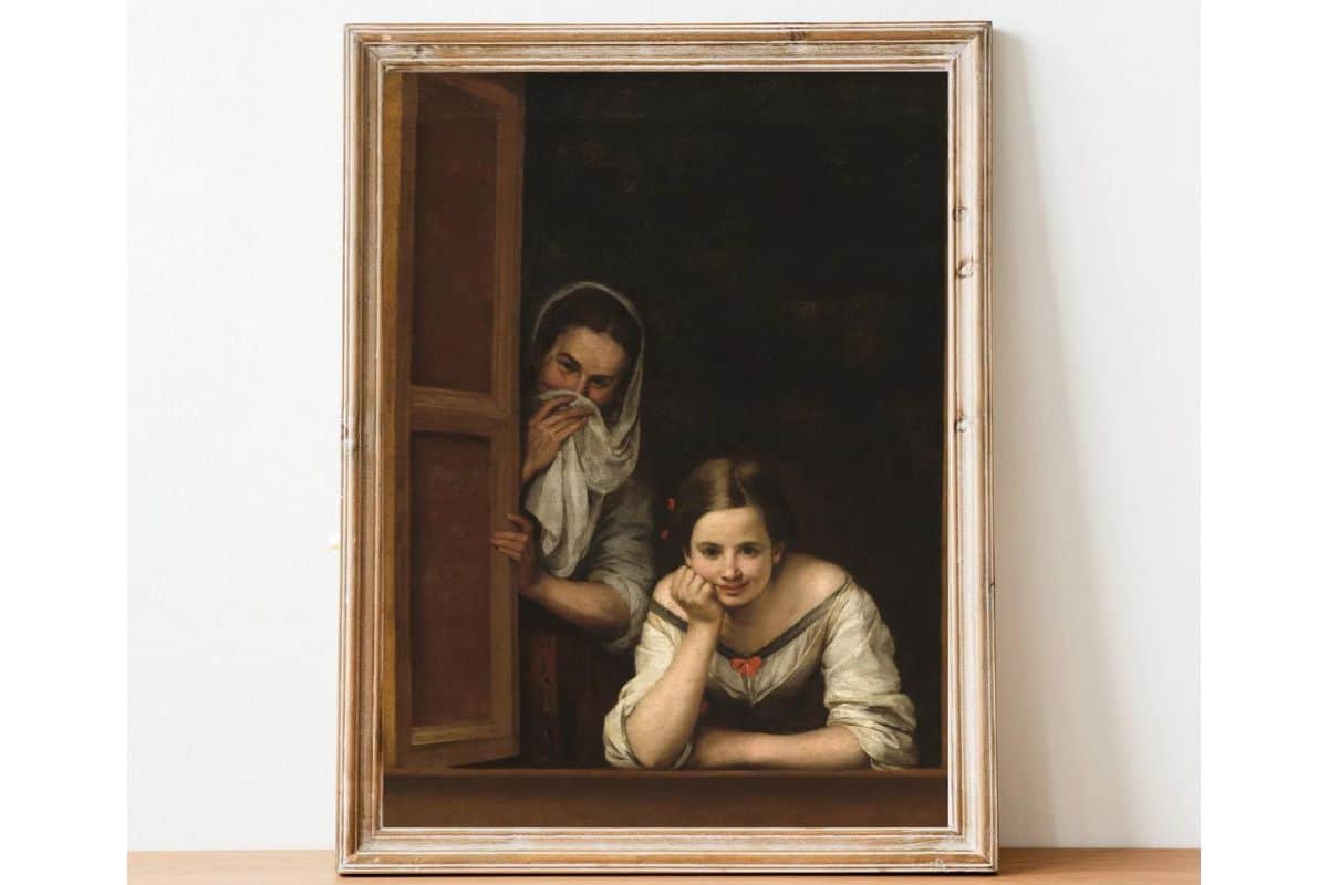 Funny bathroom art of two woman looking out a window and giggling.