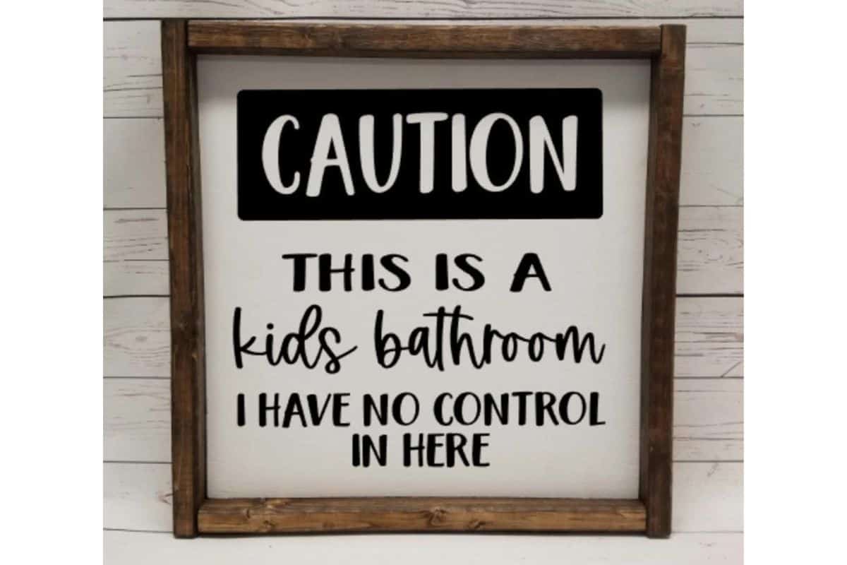 Bathroom Sign - caution this is a kids bathroom I have no control in here.