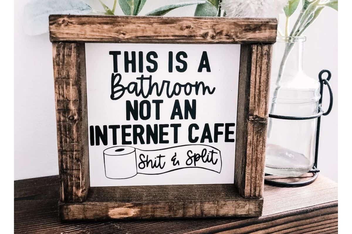 A sign that reads - this is a bathroom not an internet cafe. Sh*t and split.