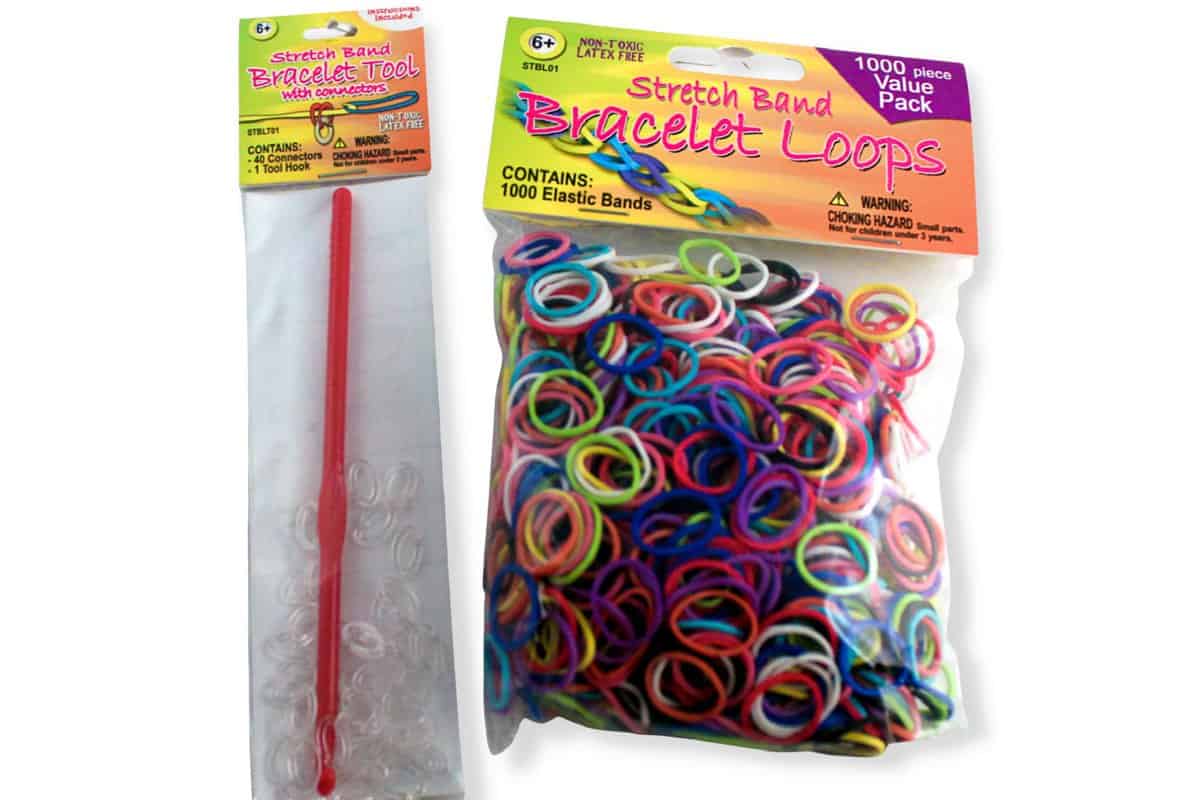 A package of loom bands and a tool with c-clips.