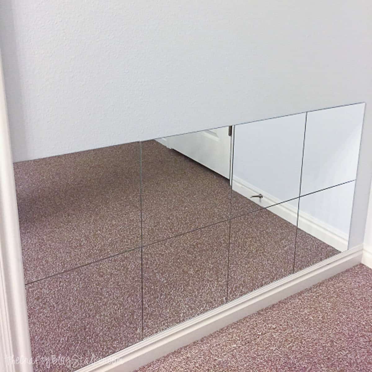 Decorative mirror wall with six panels for stylish home update.