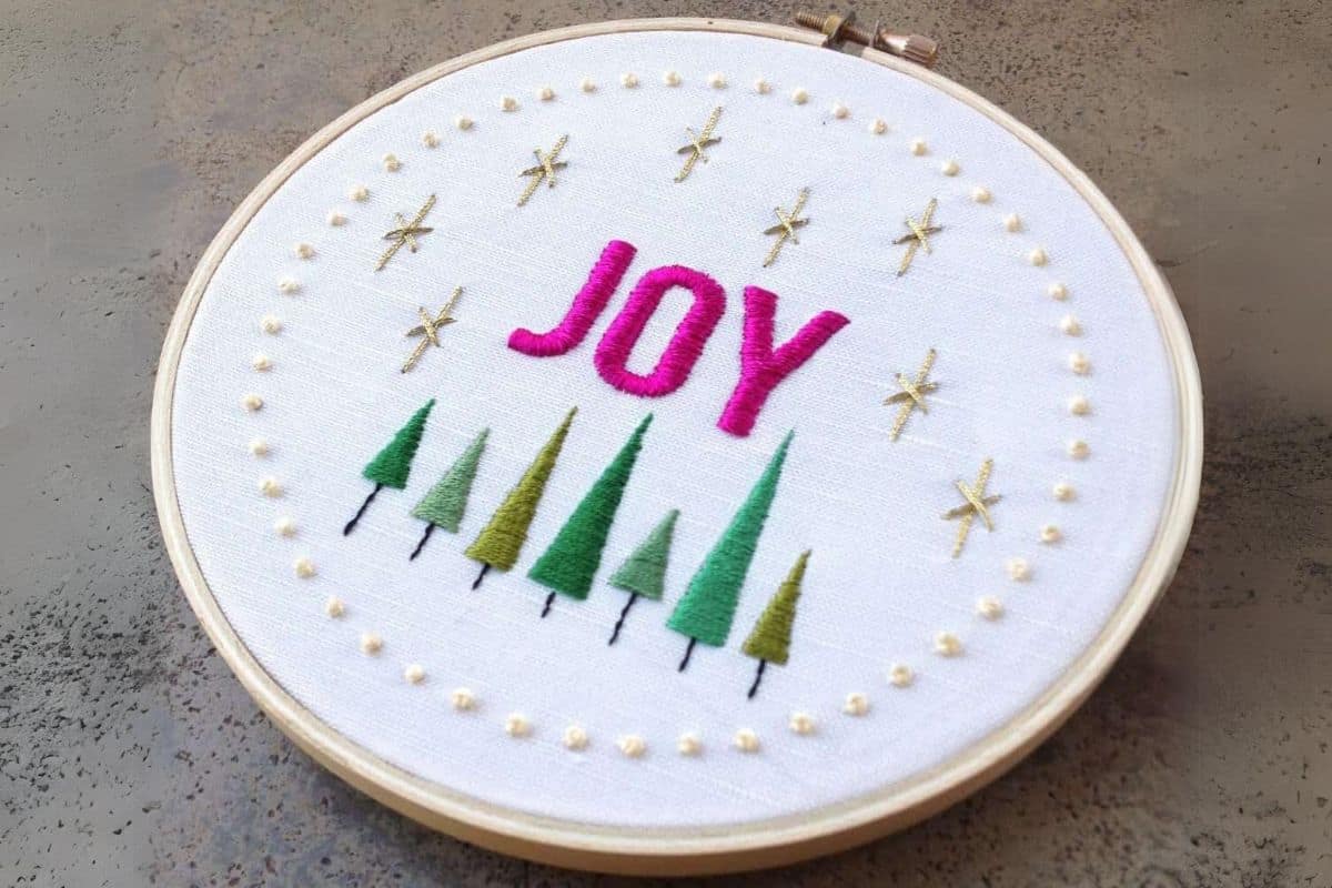 Joy Embroidery.