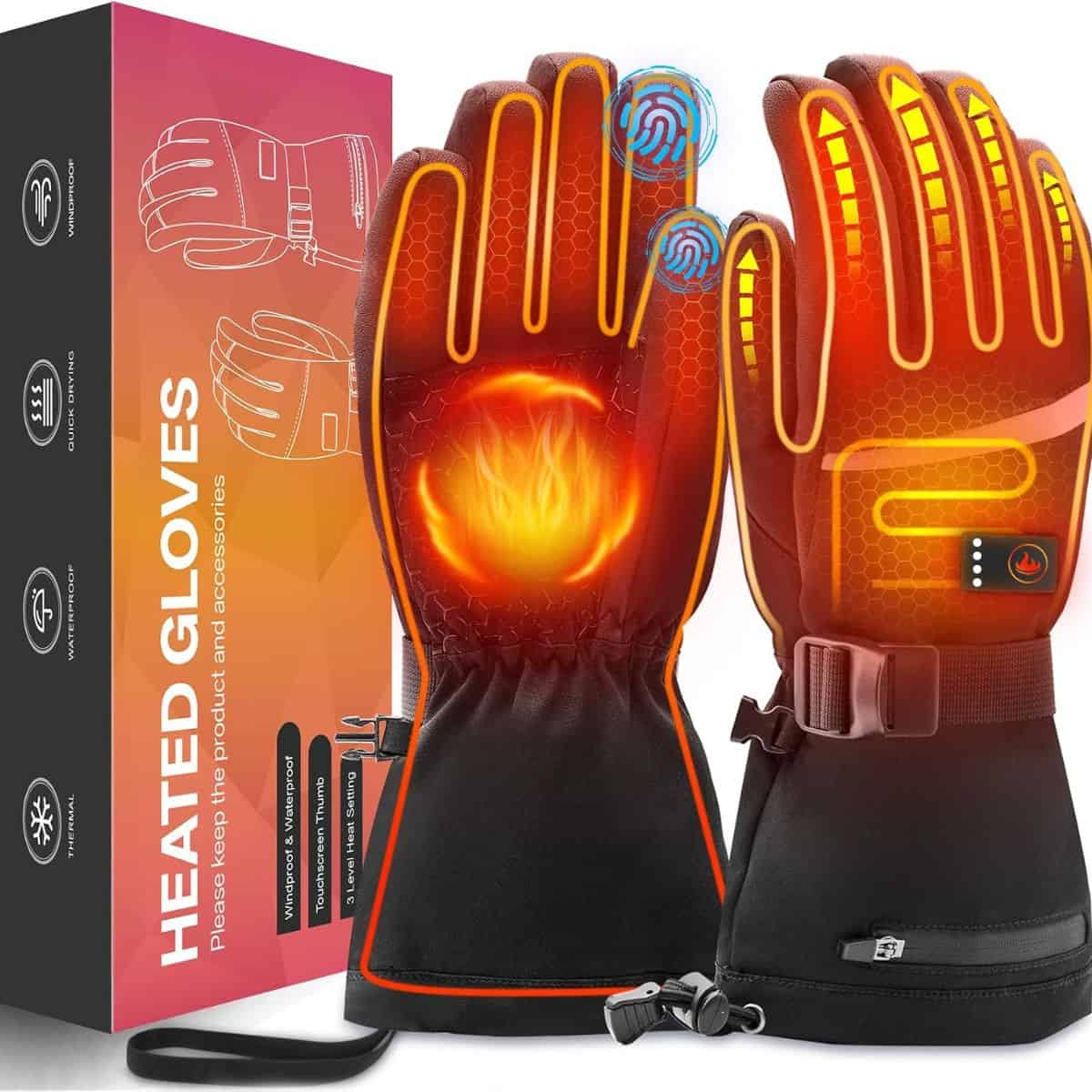 Black heated gloves with orange accents, touchscreen fingertips, adjustable wrist straps, and a heat control button.