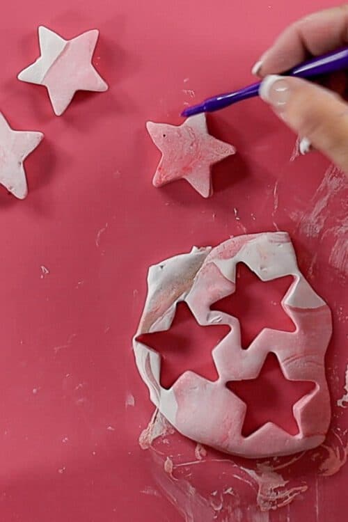 poking a whole in the clay stars