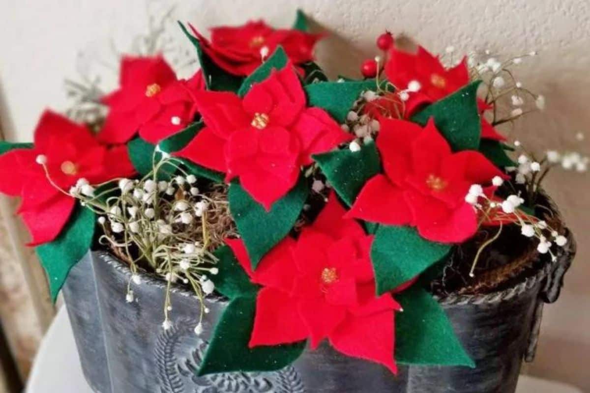 Felt Poinsettias in a metal pot.