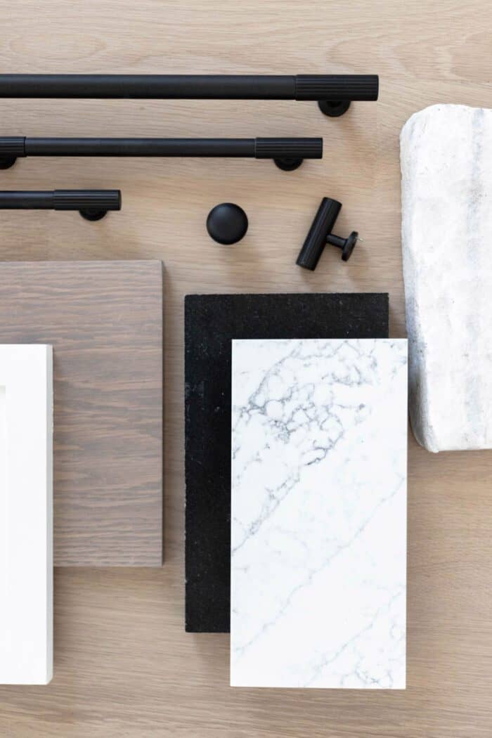 Kitchen selections for a new build with wood cabinets, marble countertops and black granite. 