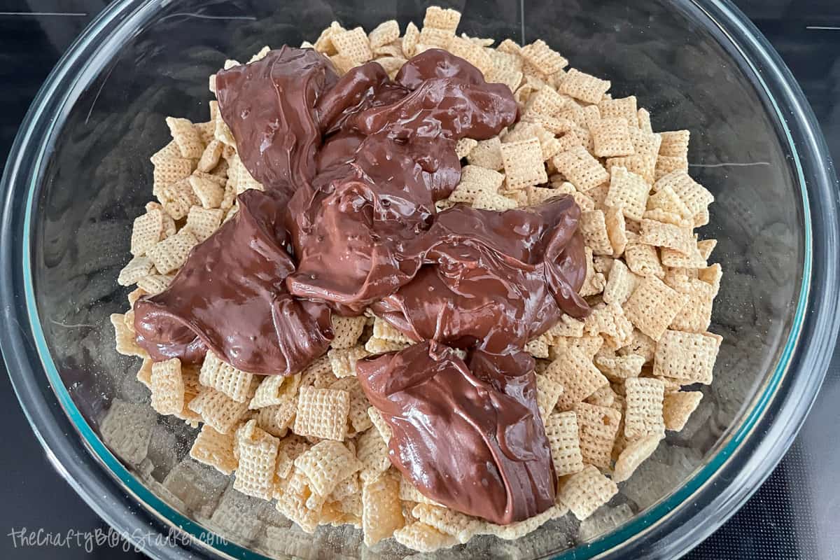 Melted chocolate on rice Chex.