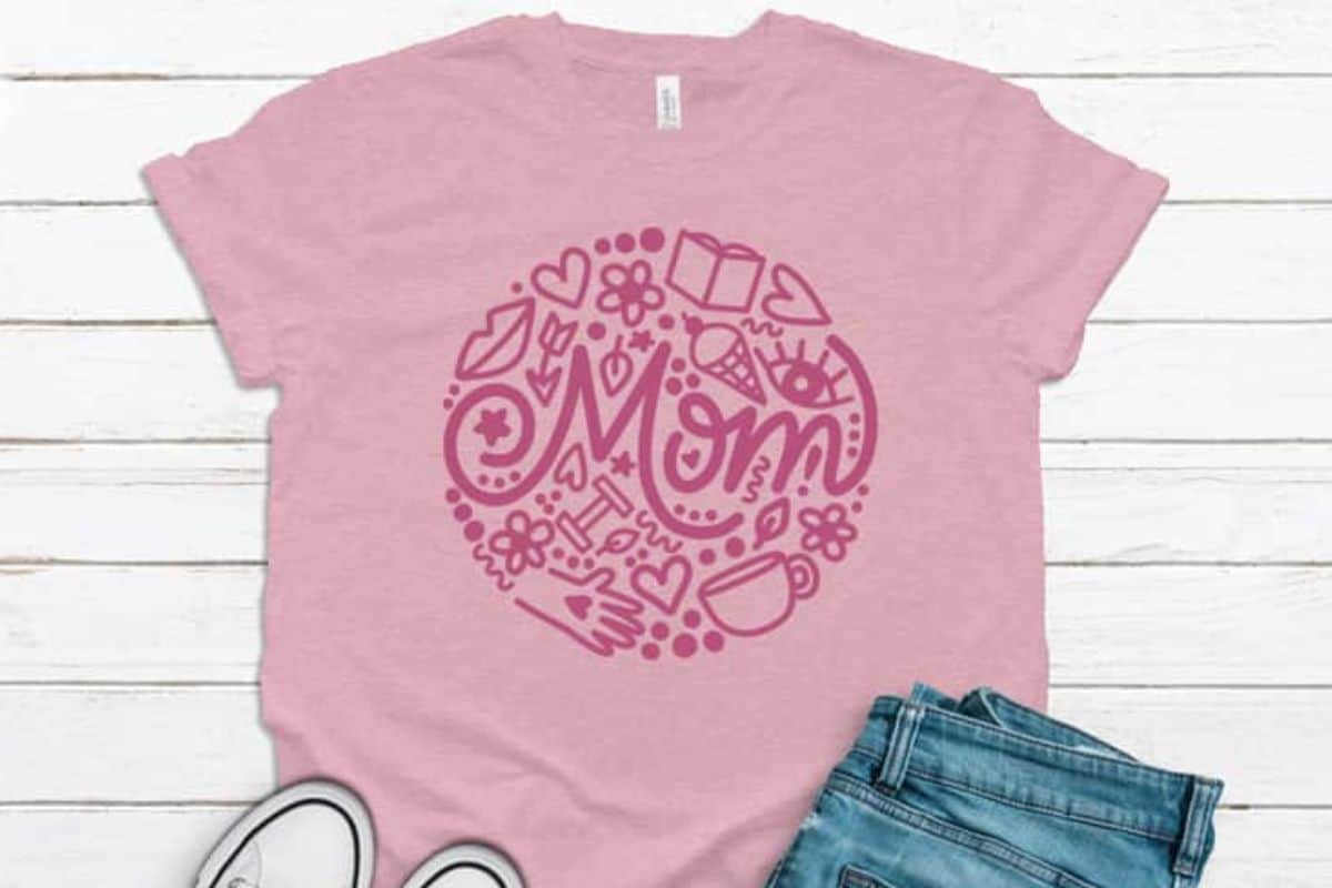 Pink shirt with a mom circle design.