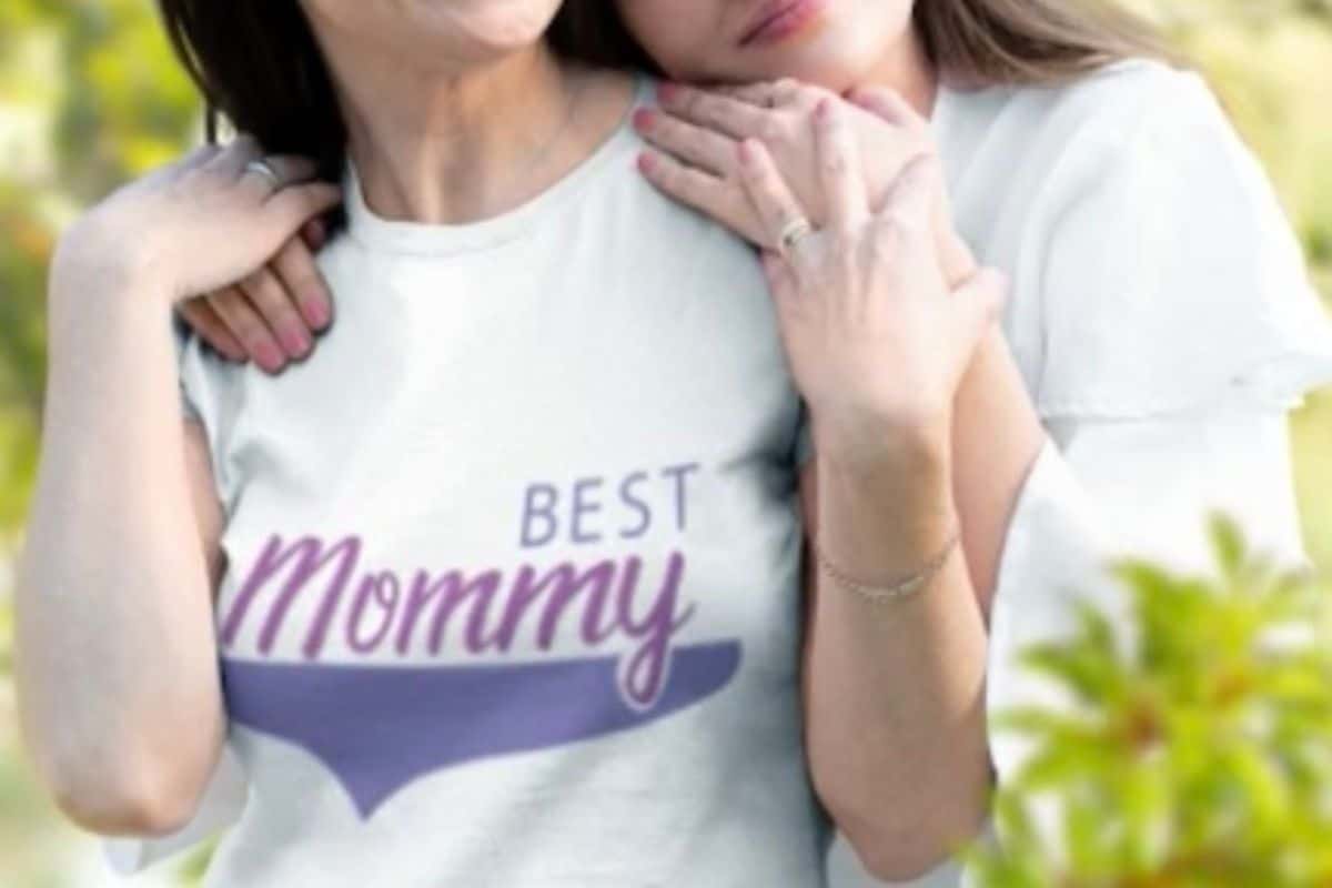 Woman hugging her mother wearing a t-shirt that says Best Mommy.