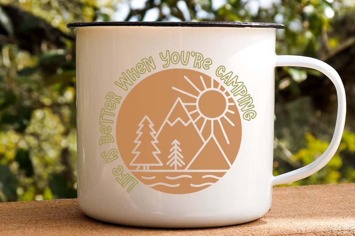 Metal cup with a design that reads 'Life is Better When You're Camping'.