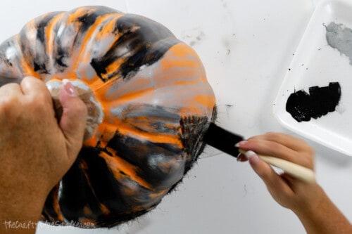 painting the pumpkin