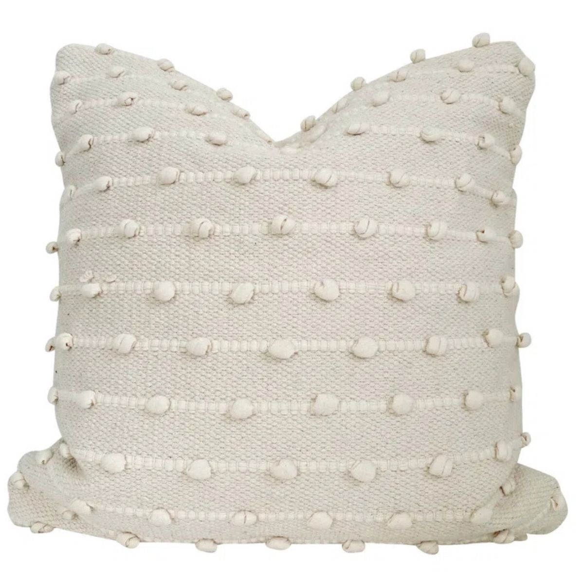 Cream boho throw pillow with woven texture and rows of raised tufted dots on a white background.
