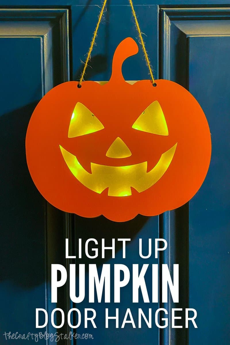title image for How to Make a Light Up Pumpkin Door Hanger for Halloween
