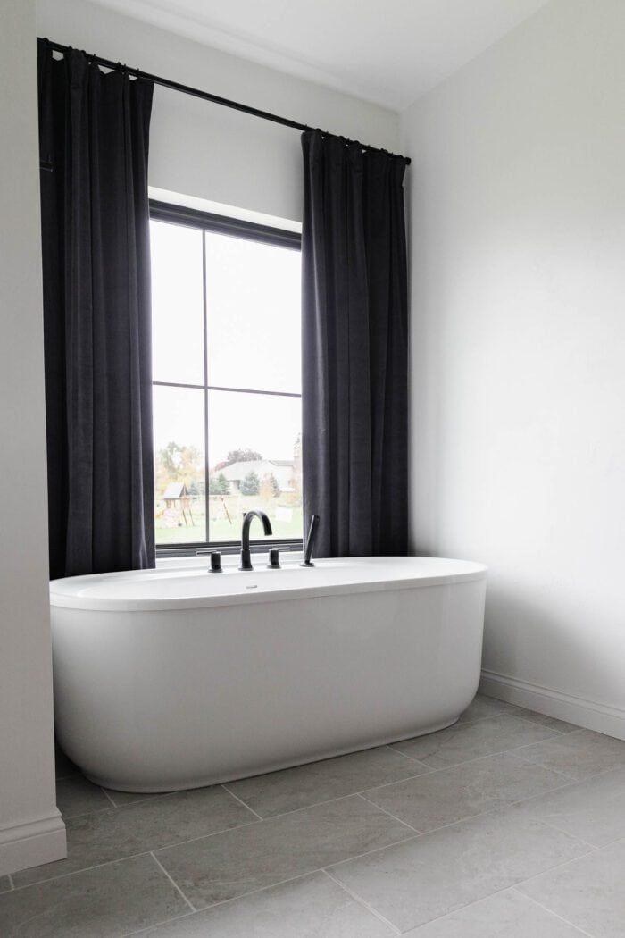 Master Bathroom Curtains behind bath tub. 